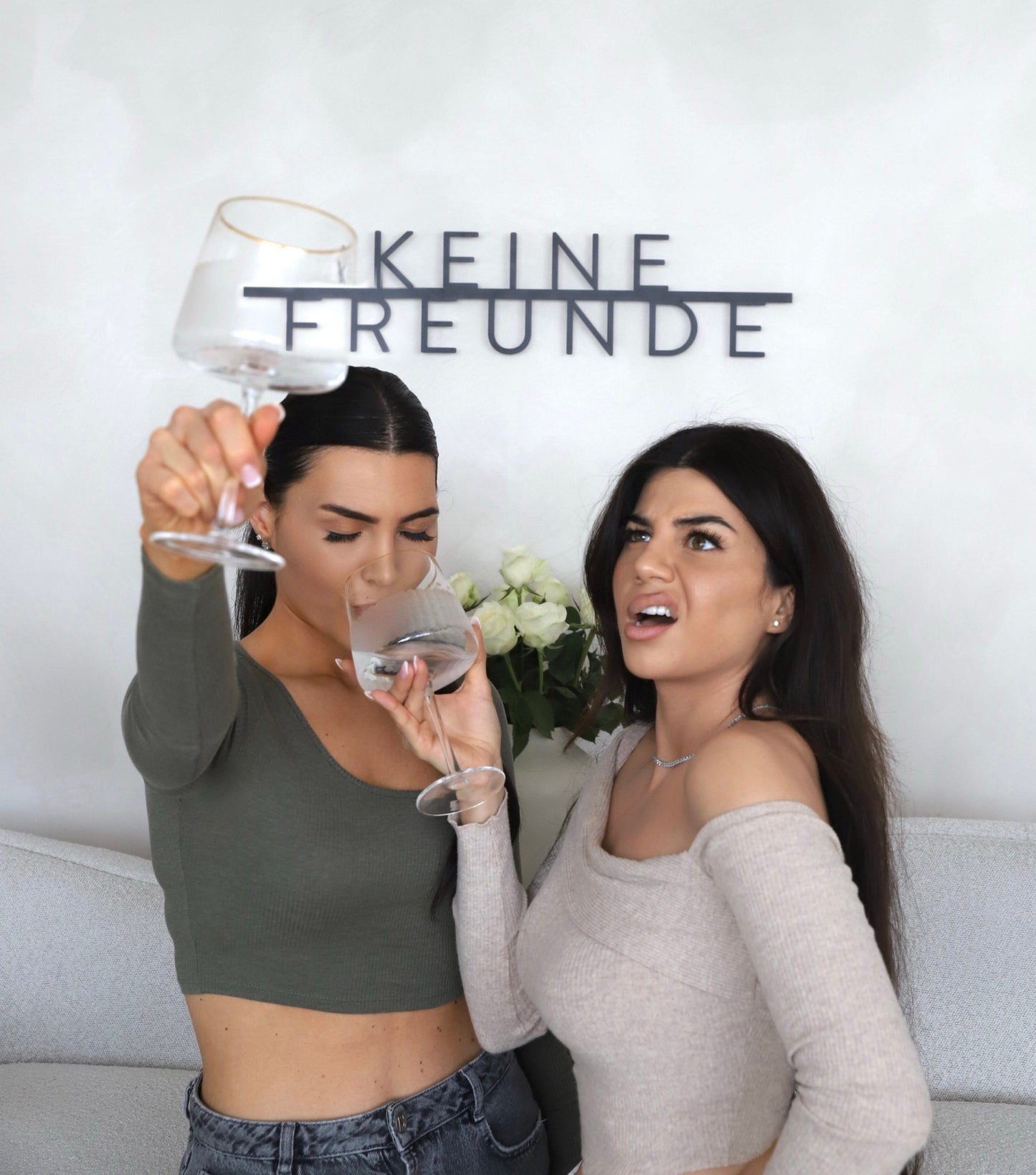 Custom metal sign displaying text in a sleek, modern font. Floating metal letters mounted on a light-colored textured background. Minimalist design suitable for home or business decor.